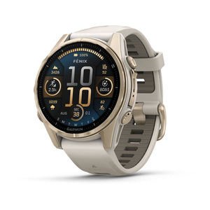 fēnix® 8 – 43 mm, AMOLED, Sapphire, Soft Gold med Fog Grey/Dark Sandstone silikonarmband – Garmin