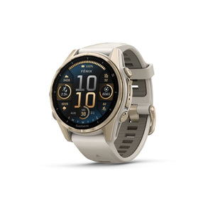 fēnix® 8 – 43 mm, AMOLED, Sapphire, Soft Gold med Fog Grey/Dark Sandstone silikonarmband – Garmin